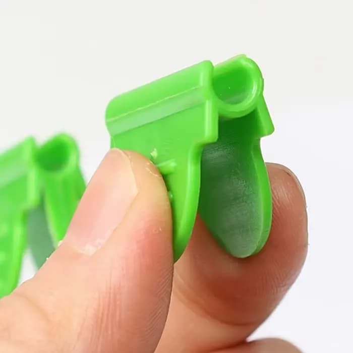 Pince à film pour serre horticole