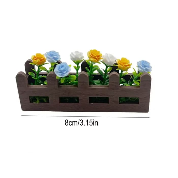 Jardinière miniature en forme de clôture fleurie